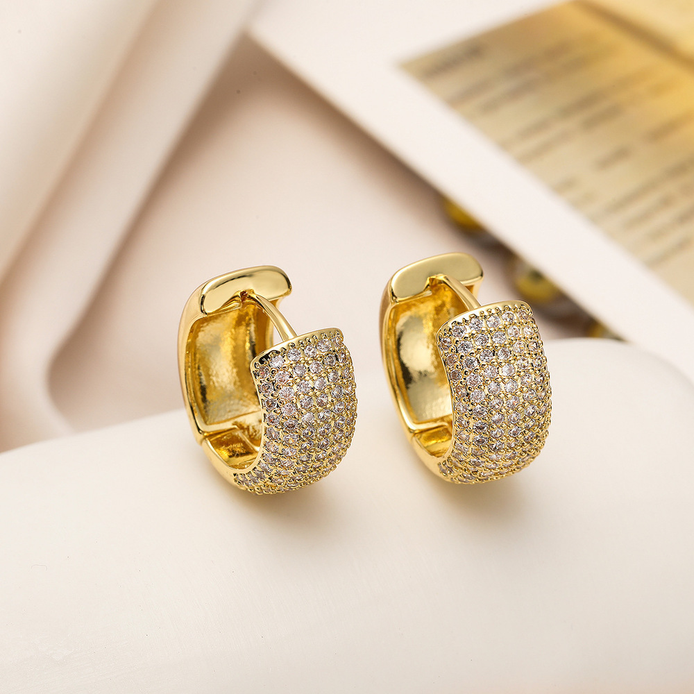 18K gold U-shaped earrings set with cubic zirconia